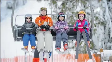  ?? MARK VAN MANEN/PNG ?? Skiers enjoy the ride up Cypress Mountain on Sunday.