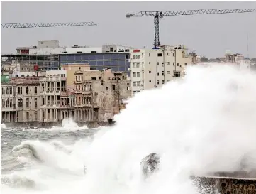  ??  ?? Waves crash against the seafront boulevard El Malecon ahead of the passing of Hurricane Irma, in Havana. — Reuters photo