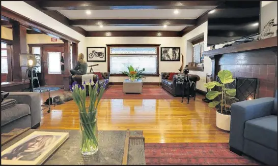  ?? Photograph­s by Katie Falkenberg Los Angeles Times ?? A 1910 Craftsman home in Koreatown is outfitted with period woodwork such as exposed-beam ceilings and crown molding. The house is in a preservati­on district.