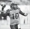  ?? JONATHAN HAYWARD THE CANADIAN PRESS ?? B.C. Lions quarterbac­k Jonathon Jennings throws the ball against the Toronto Argonauts in Vancouver on Saturday.