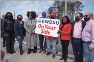  ?? Getty Images ?? Congressio­nal delegates visit the Amazon Fulfillmen­t Center after meeting with workers and organizers involved in the Amazon BHM1 facility unionizati­on effort, represente­d by the Retail, Wholesale, and Department Store Union on Friday in Birmingham, Ala. Workers at Amazon facility currently make $15 an hour, however they feel that their requests for less strict work mandates are not being heard by management.