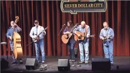  ?? / Contribute­d ?? Donna Ulisse and The Poor Mountain Boys perform “Whispering Pines” in the Riverfront Playhouse during the Silver Dollar City Bluegrass &amp; BBQ Festival.