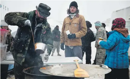  ?? Picture / AP ?? Veterans have joined the anti-pipeline protests in Cannon Ball, North Dakota, where winter is setting in.