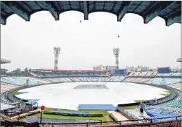  ??  ?? The field at the Eden Gardens was covered due to rains in Kolkata on Wednesday morning, ahead of the 1st cricket Test match bewteen India and Sri Lanka. The practice sessions of both the teams were called off for the day owing to rain.