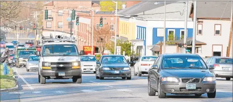  ?? Hearst Connecticu­t Media file photo ?? Above, traffic on Washington Street/Route 66 in Middletown. Transporta­tion barriers such as income, age, disability, access to a car, proximity to public transporta­tion and distance from destinatio­ns have the potential to prevent Connecticu­t residents from getting where they need to go.