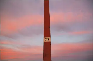  ?? Liz Moughon / The Chronicle ?? Golden Gate Bridge light pole 77 is where Kyle Gamboa, 18, jumped on Sept. 20, 2013.