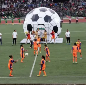  ?? — PTI ?? Students perform at the launch of Mission Football programme in Shillong on Saturday.