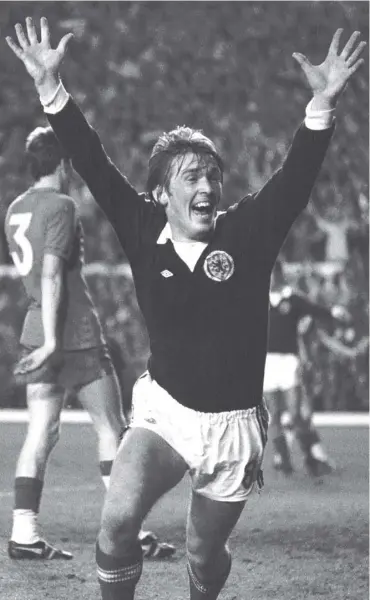  ??  ?? Kenny Dalglish celebrates his goal in the World Cup qualifier against Wales at Anfield in 1977 which sent Scotland to the finals the following year. Dalglish played in three World Cups and won 102 caps.