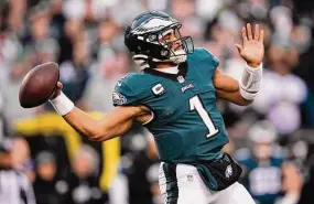  ?? Matt Rourke/Associated Press ?? Philadelph­ia Eagles quarterbac­k Jalen Hurts passes during the first half of the NFC Championsh­ip game against the San Francisco 49ers on Jan. 29.