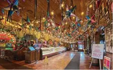  ?? Mike Sutter / Staff ?? The iconic Mi Tierra Cafe y Panaderia in San Antonio sits notably empty, able to offer only to-go food and drinks.