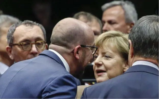  ??  ?? Charles Michel en Angela Merkel bij een eerdere ontmoeting. © pn