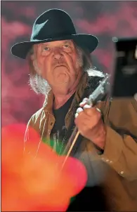  ?? AP ?? Neil Young performs at the Farm Aid concert in 2015.