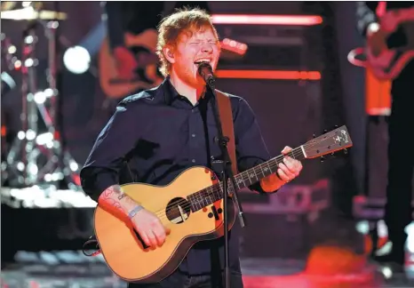  ?? CHRISTIAN CHARISIUS / REUTERS ?? Ed Sheeran performs during the Golden Camera award ceremony of German TV magazine “Hoer Zu” in Hamburg.