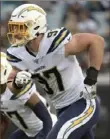  ?? Associated Press ?? Chargers defensive end Joey Bosa becomes the highestpai­d defender in the NFL.