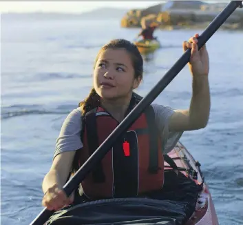  ?? MONGREL MEDIA ?? Ta’kaiya Blaney plays an Indigenous girl who paddles up the coast of British Columbia to testify about the dangers of allowing supertanke­rs into the nearby waters in the movie Kayak to Klemtu.