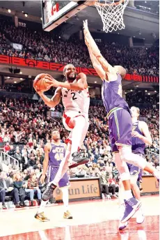  ?? — AFP photo ?? Kawhi Leonard #2 of theToronto Raptors shoots the ball against the Utah Jazz on January 1, 2019 at the Scotiabank Arena in Toronto, Ontario, Canada.