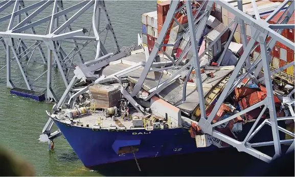  ?? Photo: Reuters ?? An aerial view of the Dali cargo vessel which crashed into the Francis Scott Key Bridge, causing it to collapse in Baltimore, Maryland, on March 26, 2024.