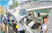  ?? RED HUBER/ORLANDO SENTINEL ?? Disney employees at Hollywood Studios sign a 40-foot long structural steel beam in 2017 in the new Star Warsthemed land.