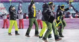  ?? NEW YORK TIMES FILE PHOTO ?? The Jamaican women’s bobsled team takes part in the opening ceremony in Pyeongchan­g.