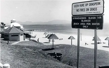  ?? /TIMES MEDIA ?? Apartheid signs in Mossel Bay before the dawn of the new era heralded in 1994. Such signs no longer exist, but does that mean a better life for the many in SA, asks the writer?