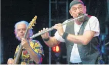  ?? FRED TANNEAU/GETTY-AFP 2007 ?? Ian Anderson, right, the leader of British rock band Jethro Tull, and British guitar player Martin Barre perform.