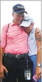  ?? WARREN LITTLE — GETTY IMAGES ?? Justin Thomas’ parents Mike and Jani Thomas react to his winning the PGA title.