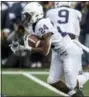  ?? TONY DING — ASSOCIATED PRESS ?? Penn State’s Miles Sanders (24) rushes against Michigan in Ann Arbor, Mich.