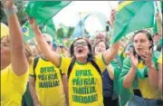  ?? AP ?? Supporters of President Jair Bolsonaro shout slogans during a protest against his defeat in Rio de Janeiro, on November 6.