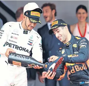  ?? Picture: Getty. ?? Lewis Hamilton has poured cold water on Daniel Ricciardo’s hopes of moving to Mercedes next year.