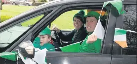  ?? (Photo: Ita West) ?? Liam and Ciara Flanagan sporting the Irish colours for the local parade in Kilfinane last Friday.