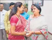  ?? PTI ?? NCP leader Supriya Sule (left) and Maharashtr­a deputy chief minister Ajit Pawar’s wife Sunetra Pawar at a temple in Baramati tehsil, in Pune district, on March 8.