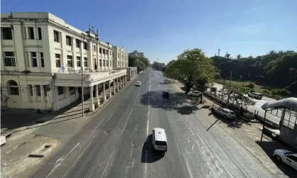  ?? ?? A near-deserted street in central Yangon on Friday as businesses closed and people stayed at home. Photograph: AP