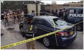  ??  ?? The militants tried to storm the main gate of Karachi’s financial centre