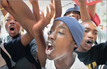  ?? Picture: KIM LUDBROOK ?? VOICES HEARD: Treatment Action Campaign supporters march through Johannesbu­rg to demand a change in the government’s approach to the HIV crisis, a sign that we are a country where people feel free to fight for their rights. Sixty years ago, thousands...