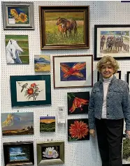  ?? Submitted photo ?? Hildegard Honold stands next to her art at Whittingto­n Gallery.