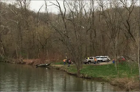  ?? BILL UHRICH — MEDIANEWS GROUP ?? The scene at the Maiden Creek in Richmond Township as crews prepared Thursday to recover a body from the waterway.