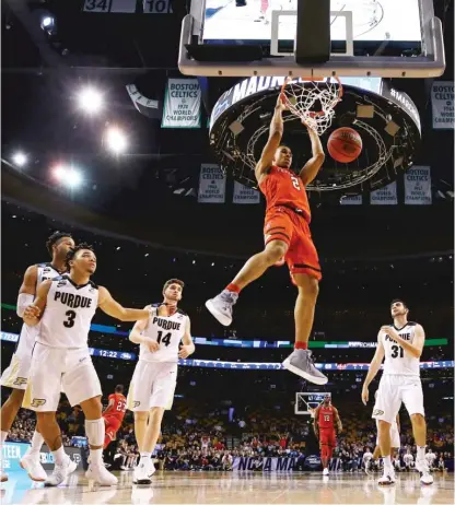  ?? | MADDIE MEYER/ GETTY IMAGES ?? Texas Tech’s Zhaire Smith dunks the ball during the second half against Purdue on Friday night in Boston.