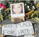  ?? — AP ?? A memorial was set up Sunday for Heather Heyer, who died when a car struck protesters in Charlottes­ville, Va.