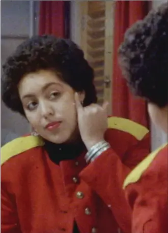  ??  ?? Poly Styrene backstage before a gig and, opposite page, her daughter Celeste Bell