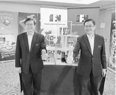  ??  ?? Lim (right) and F&amp;N chief financial officer Tan Hock Beng (left) at the group's media briefing on its financial results for FY2018 yesterday.