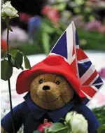  ?? —aFp ?? some mourners had left paddington bear plush toys and marmalade sandwiches as tributes to the Queen.