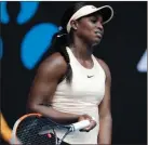  ?? Dita Alangkara / AP ?? United States’ Sloane Stephens reacts while playing China’s Zhang Shuai.