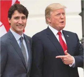  ?? SAUL LOEB AGENCE FRANCE-PRESSE ?? Les oeuvres culturelle­s définissan­t les mandats de Justin Trudeau et de Donald Trump sont aux antipodes.