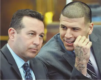  ?? STAFF PHOTOS BY JOHN WILCOX (LEFT) AND CHRIS CHRISTO (ABOVE) ?? GAME OVER: Aaron Hernandez sits next to his attorney Jose Baez, above, during his trial last week. The former Patriot was found dead in his cell at the Souza-Baranowski Correction­al Center, left, yesterday.