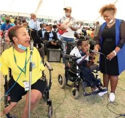  ?? ?? President Mnangagwa hands over prizes to Tafadzwa Matope. (Right) Chipo Muchegwa of “Mwoyo Wangu” fame leads an ensemble at theNationa­l Disability Expo in Gweru yesterday. — Pictures: Tawanda Mudimu