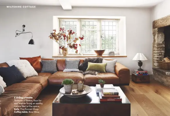  ??  ?? Living room
Textures of fleece, faux fur and leather bring an earthy, natural feel to the space. The Conran Shop. Bow Wow
Sofa,
Coffee table,