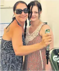  ??  ?? Lion Brewery bar staff Jo Gale and Leanne Moore running the beer tent.