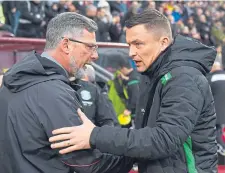  ??  ?? Craig Levein and Paul Heckingbot­tom are both under pressure after poor starts for Hearts and Hibs.