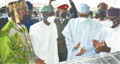  ?? Image by Pius Okeosisi ?? L-R: Chibuike Amaechi, minister of transporta­tion; Babajide Sanwo-Olu, governor, Lagos State ; President Muhammadu Buhari; and Kayode Fayemi governor, Ekiti State, during the inaugurati­on of Lagos-Ibadan standard rail gauge for commercial operation in Lagos.