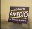 ??  ?? A sign touts Amedio’s candidacy.